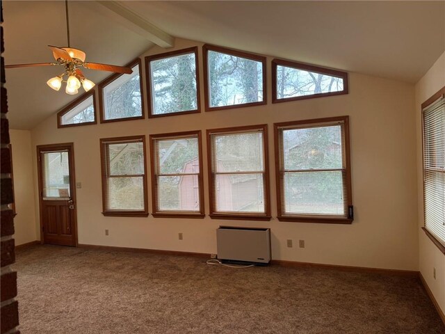 interior space featuring beamed ceiling, ceiling fan, high vaulted ceiling, and carpet