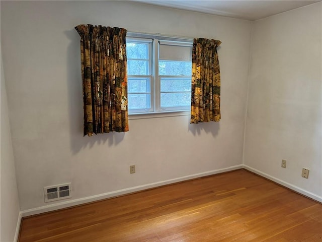 empty room featuring light wood-type flooring