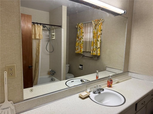 full bathroom with toilet, shower / bathtub combination with curtain, and sink