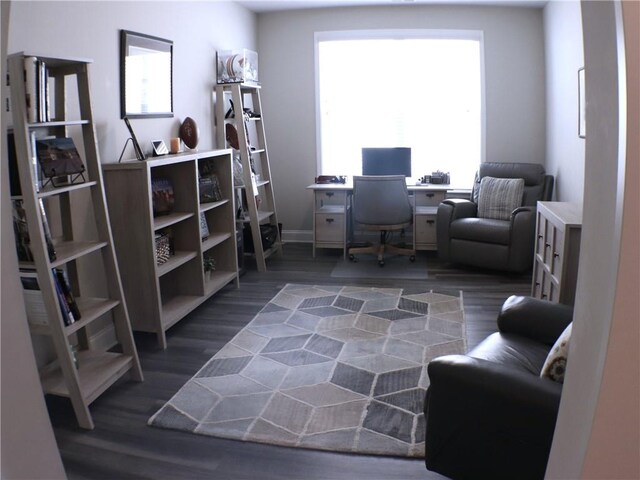 office with baseboards and dark wood-style floors