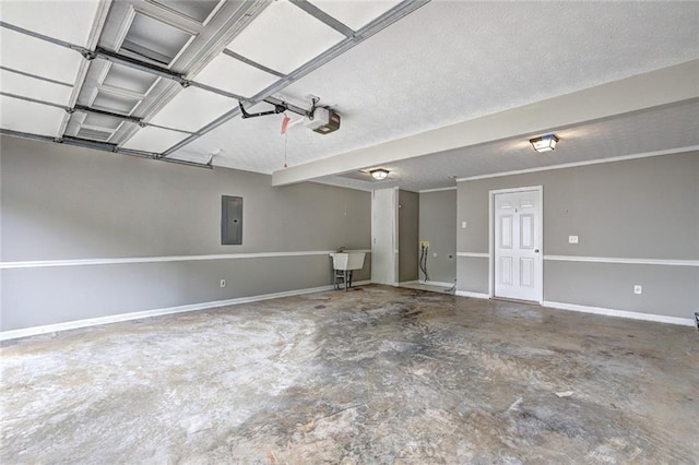 garage with baseboards, a garage door opener, and electric panel