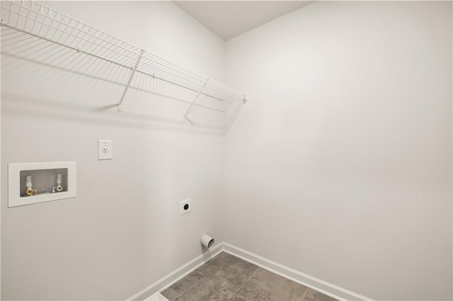 clothes washing area with tile patterned floors, hookup for an electric dryer, and hookup for a washing machine