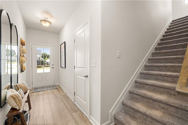 doorway to outside featuring light wood-type flooring