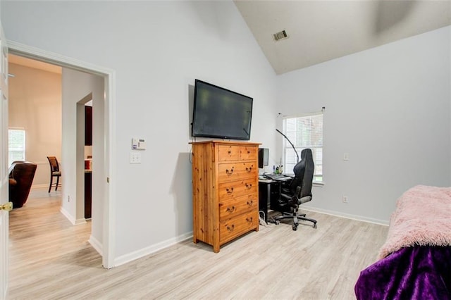 468 Berkshire Pl, Fairburn, GA 30213 - bedroom featuring light wood-style floors, multiple windows, high vaulted ceiling, a desk, and baseboards