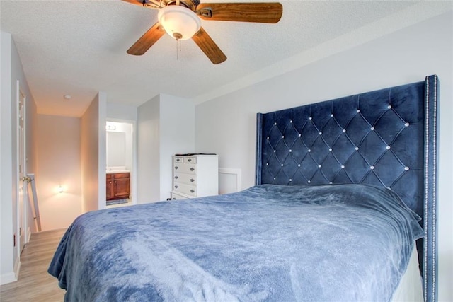 468 Berkshire Pl, Fairburn, GA 30213 - bedroom featuring light wood-style flooring, a ceiling fan, and connected bathroom