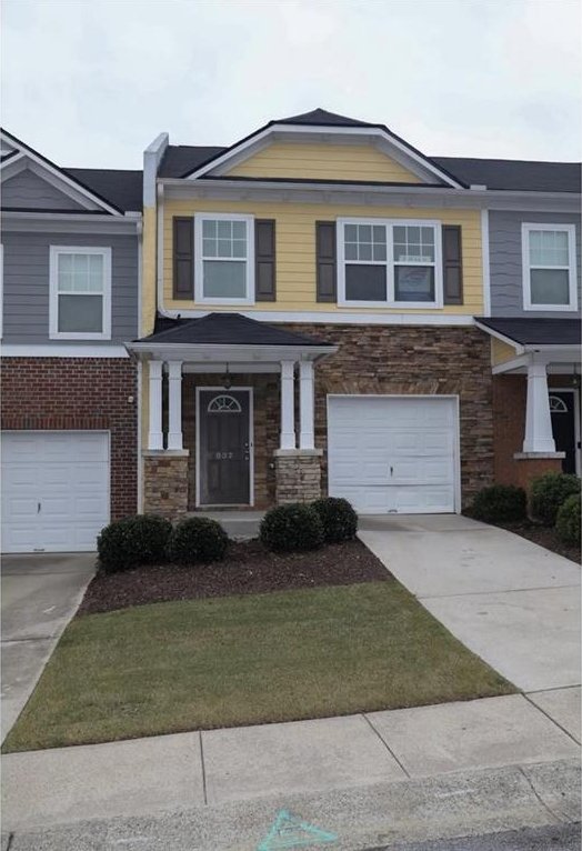 view of front of property with a garage