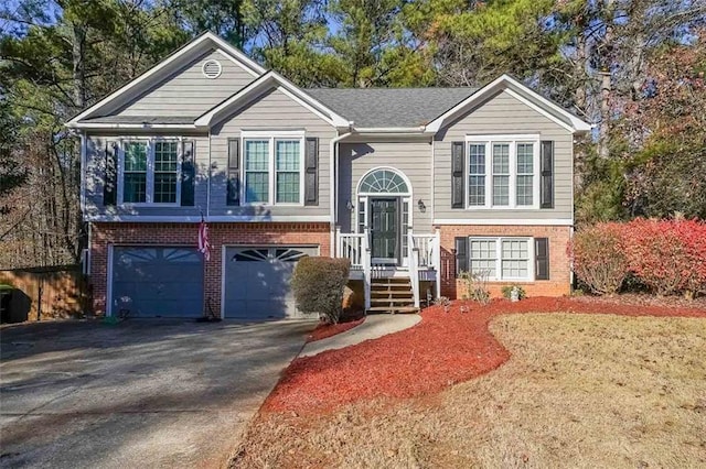 bi-level home featuring a garage