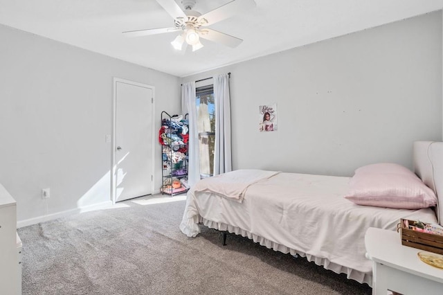 bedroom with ceiling fan and carpet floors