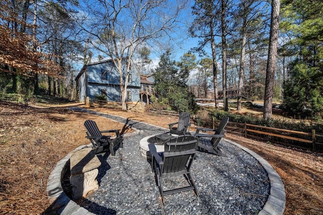 view of yard with an outdoor fire pit and a patio area