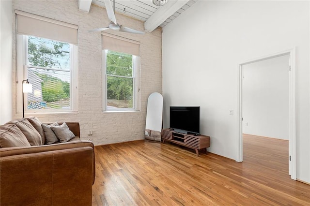 210 Walker St SW Unit 3, Atlanta, GA 30313 - living room with light wood-type flooring, brick wall, a towering ceiling, and wooden ceiling with exposed beams