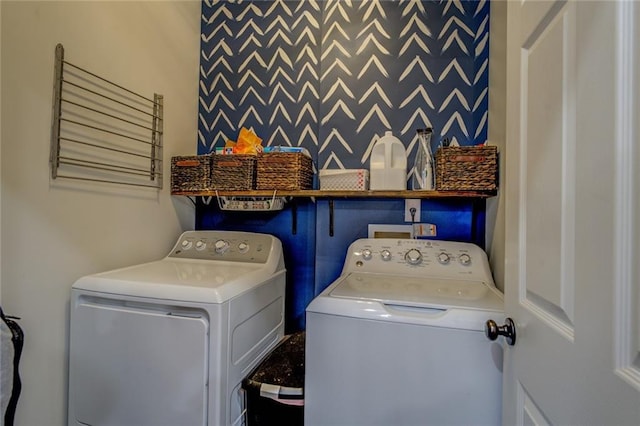 washroom featuring laundry area and independent washer and dryer