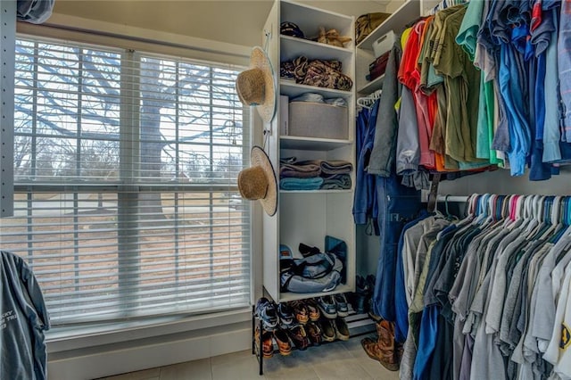 walk in closet featuring tile patterned flooring