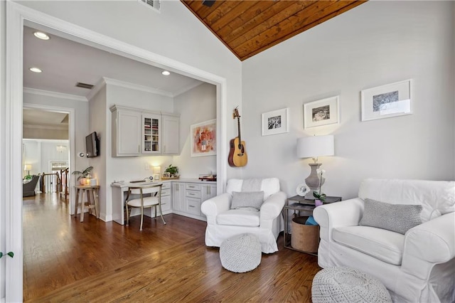 living room featuring dark wood-style floors, recessed lighting, vaulted ceiling, and crown molding