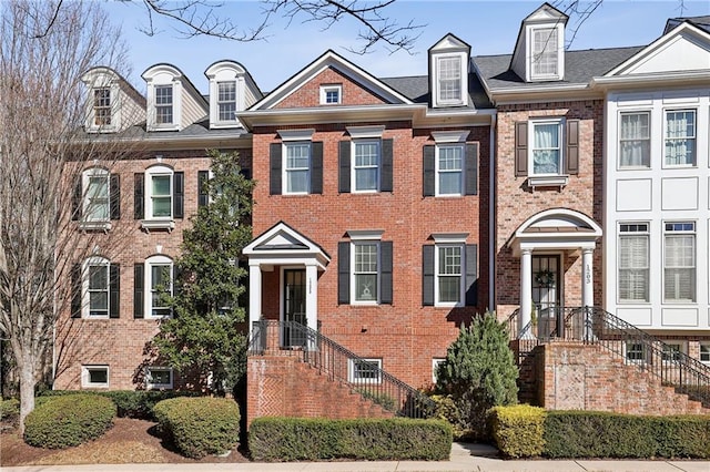 multi unit property featuring brick siding