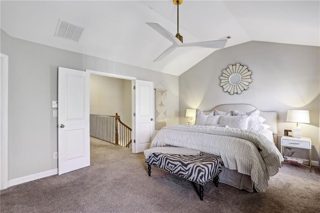 bedroom with a ceiling fan, carpet, visible vents, and vaulted ceiling