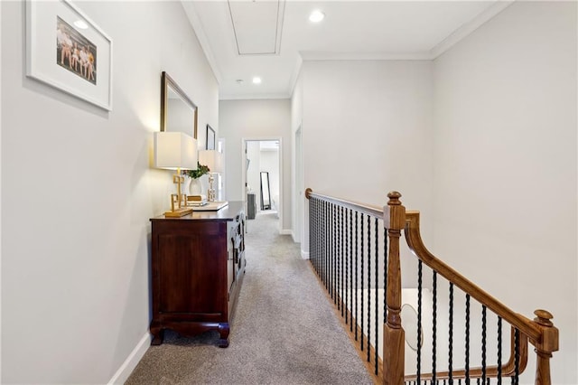 corridor featuring ornamental molding, carpet, recessed lighting, and baseboards