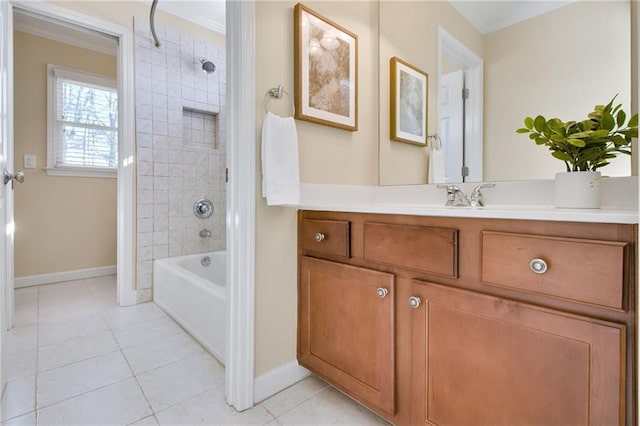 bathroom featuring tiled shower / bath combo, vanity, ornamental molding, and tile patterned floors