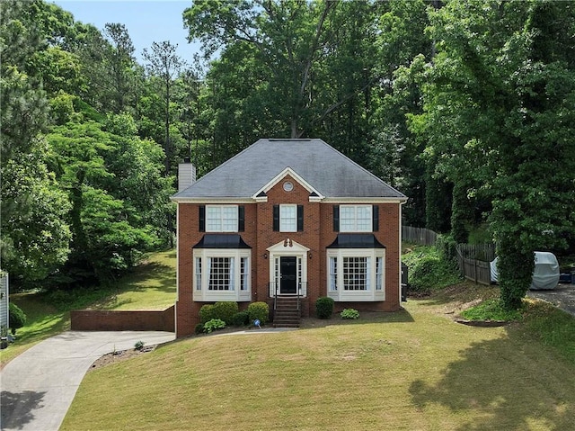 3075 Milford Chase SW, Marietta, GA 30008 - view of front of home with a chimney and brick siding