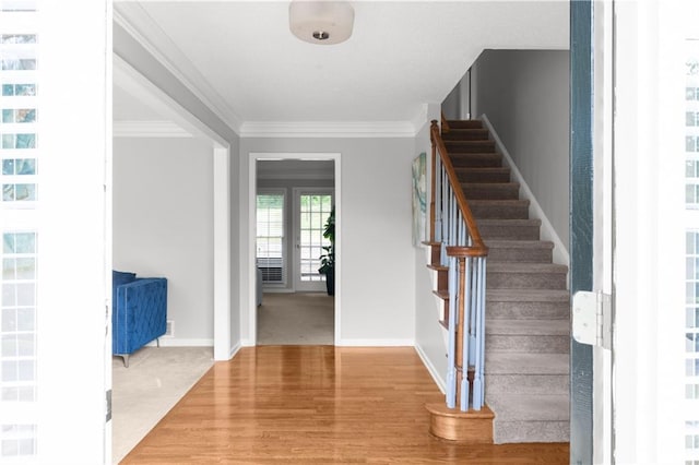 3075 Milford Chase SW, Marietta, GA 30008 - foyer with stairs, crown molding, baseboards, and light colored carpet