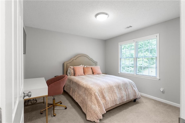 3075 Milford Chase SW, Marietta, GA 30008 - carpeted bedroom featuring baseboards and a textured ceiling