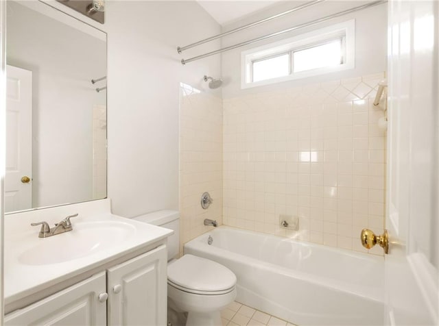 full bath with shower / bath combination, vanity, toilet, and tile patterned floors