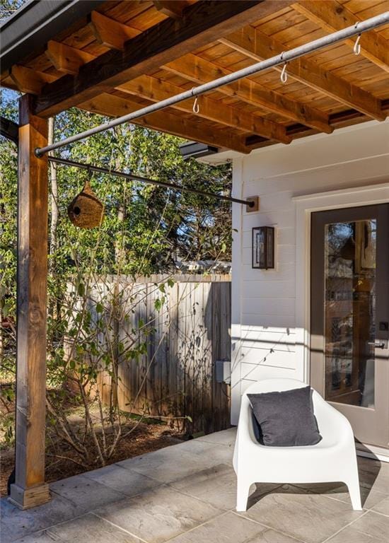 view of patio with fence