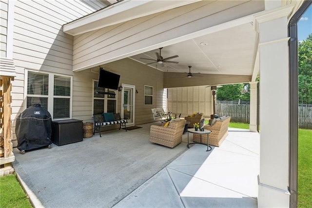 view of patio / terrace with an outdoor living space, ceiling fan, fence, and a grill
