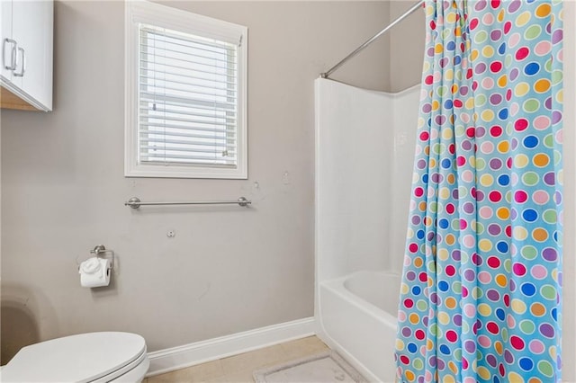 full bathroom featuring toilet, baseboards, and shower / bath combination with curtain