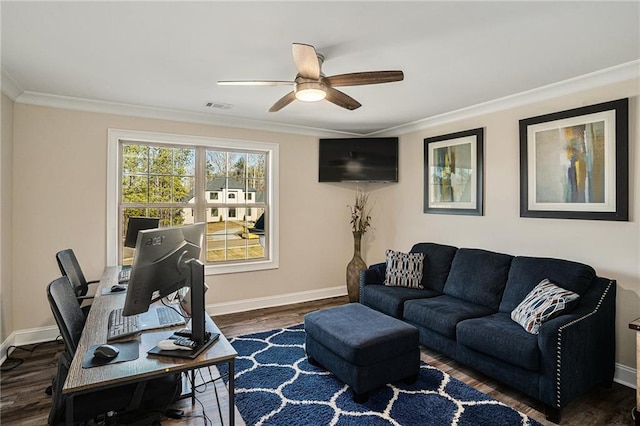 living room featuring dark hardwood / wood-style floors, ceiling fan, and ornamental molding