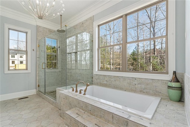 bathroom featuring a chandelier, tile patterned floors, separate shower and tub, and ornamental molding