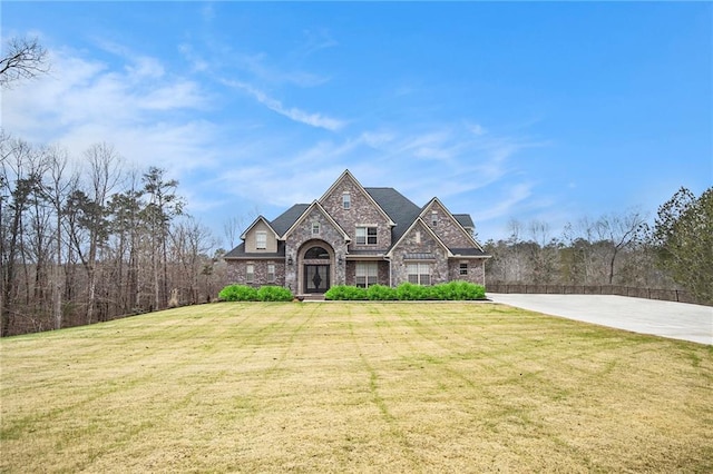 view of front of property with a front lawn