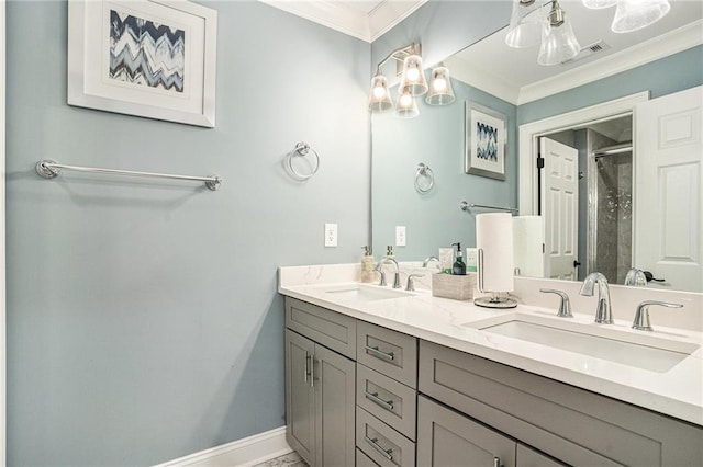 bathroom with vanity, a shower with door, and crown molding