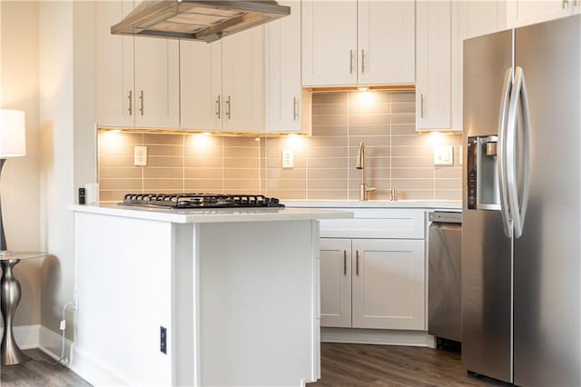 kitchen with stainless steel appliances, dark hardwood / wood-style flooring, white cabinetry, and custom range hood