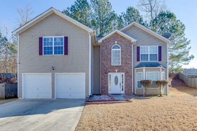 front of property with a garage