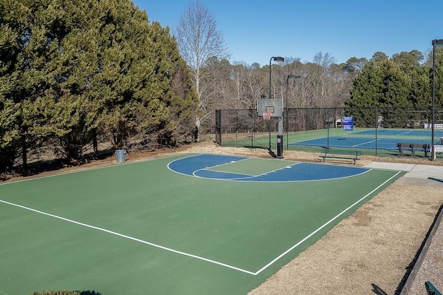 view of sport court with tennis court