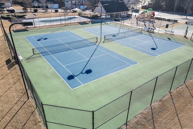 view of sport court with basketball hoop