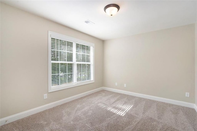 5712 Grande River Rd, Atlanta, GA 30349 - empty room with carpet and baseboards