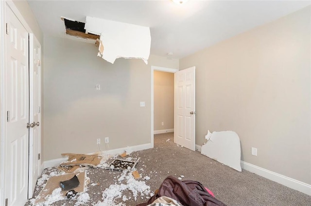 5712 Grande River Rd, Atlanta, GA 30349 - unfurnished bedroom featuring baseboards