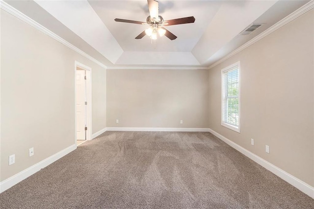 5712 Grande River Rd, Atlanta, GA 30349 - carpeted empty room with a raised ceiling, a ceiling fan, baseboards, and crown molding