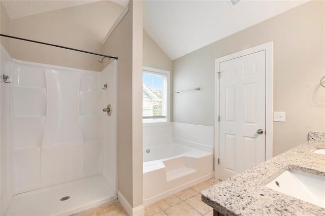 5712 Grande River Rd, Atlanta, GA 30349 - bathroom with lofted ceiling, a bath, tile patterned floors, double vanity, and a shower