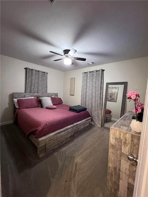 bedroom featuring ceiling fan and carpet flooring