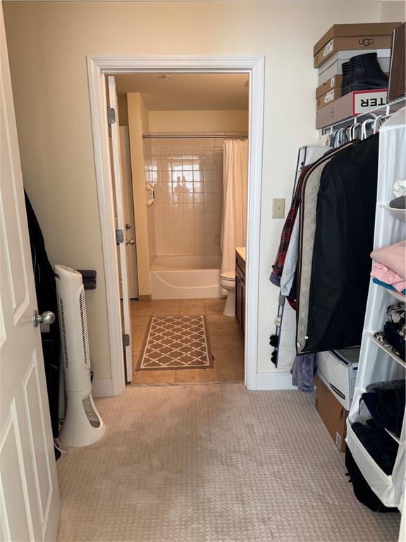 bathroom with tile patterned floors and vanity