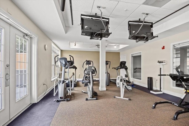 gym featuring a paneled ceiling