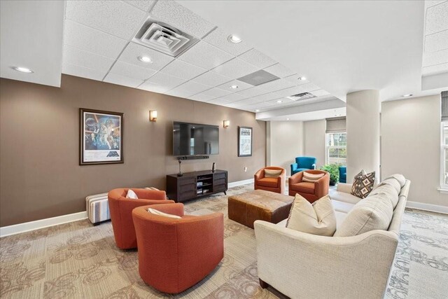 interior space featuring a paneled ceiling