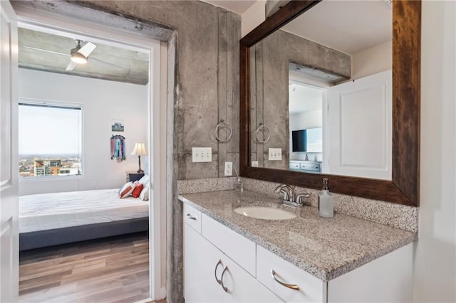 bathroom featuring vanity and wood-type flooring