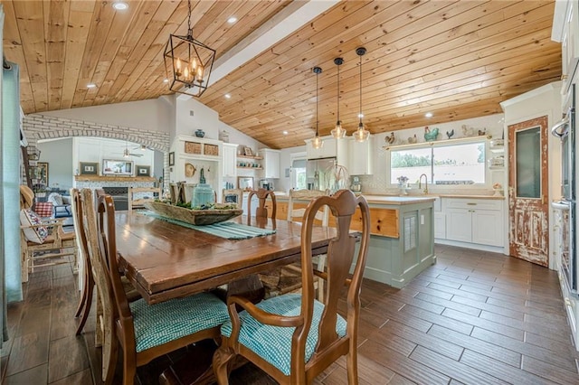 dining space with wood ceiling, a chandelier, lofted ceiling, recessed lighting, and dark wood-type flooring