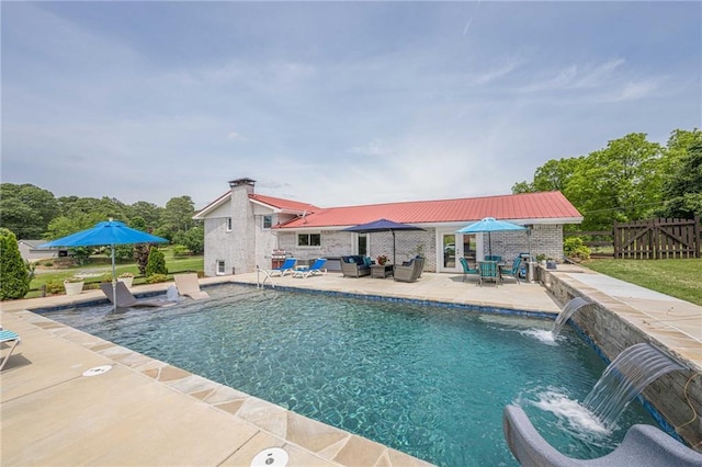 view of swimming pool featuring outdoor lounge area, a patio area, and fence