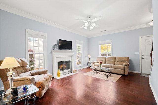 living room featuring crown molding, ceiling fan, and dark hardwood / wood-style flooring