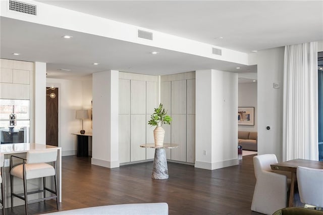 interior space with dark wood-type flooring