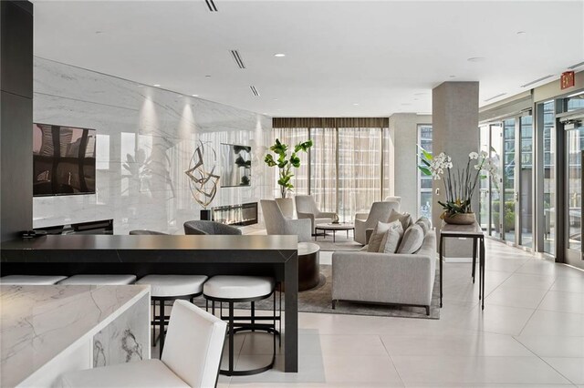 living room with light tile patterned floors